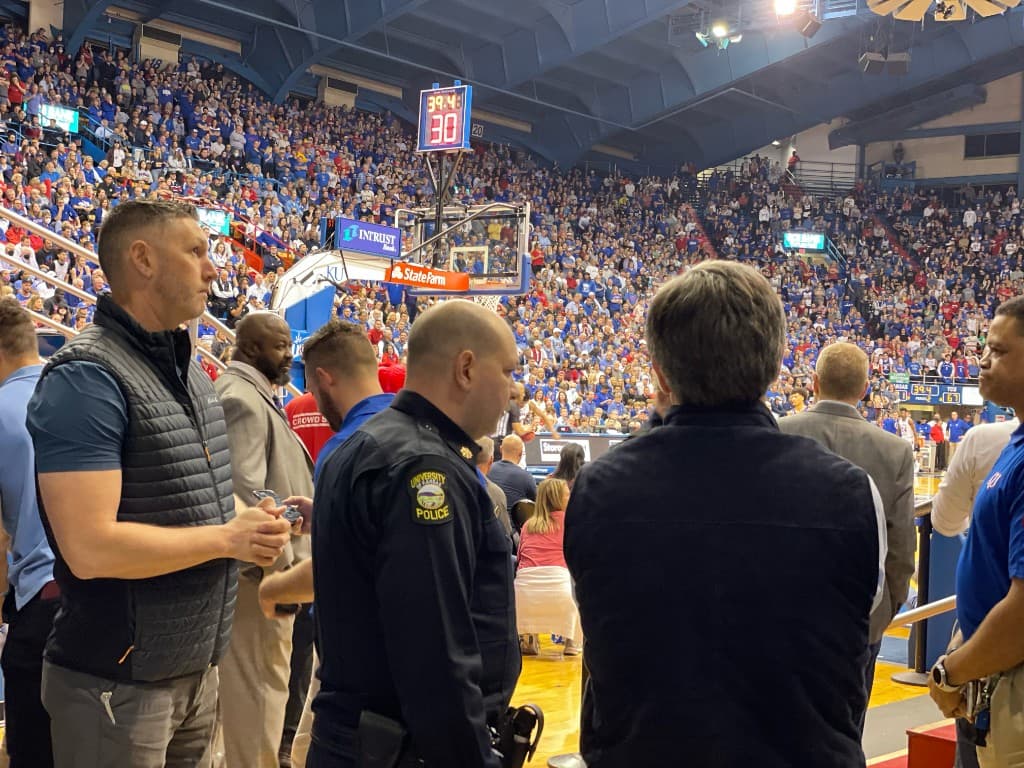 Rob Gunderson working a protective detail at the KU Fieldhouse